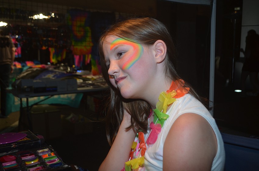 Sarah Hunter got a rainbow painted on her face.