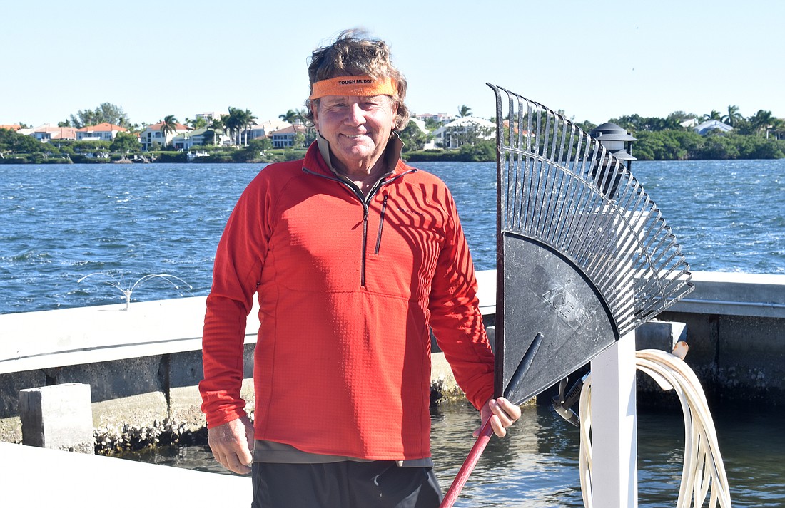 Mike Bergin nicknamed himself Marina Joe after taking on the duty of clearing Twin Shores of red tide fish kill.