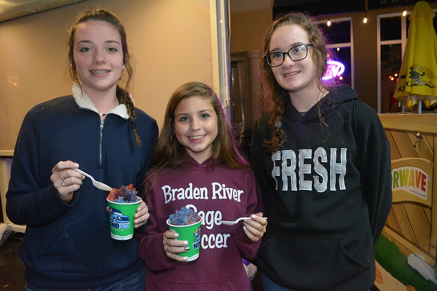 Haile Middle School students Sarah Diveley, Greta Noll and Jordan Martinez enjoy hanging out together.