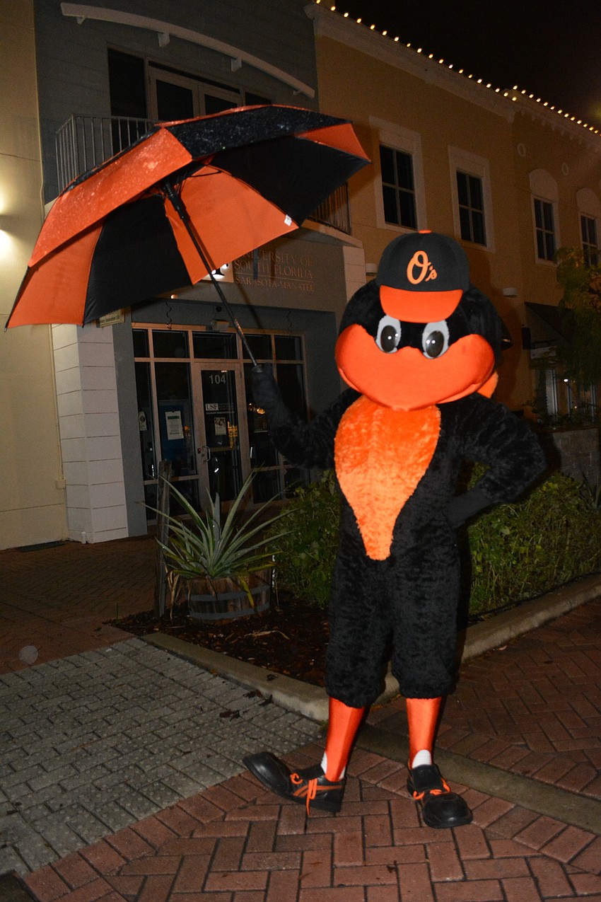 The Baltimore Orioles mascot, The Bird, visits with guests at the event.