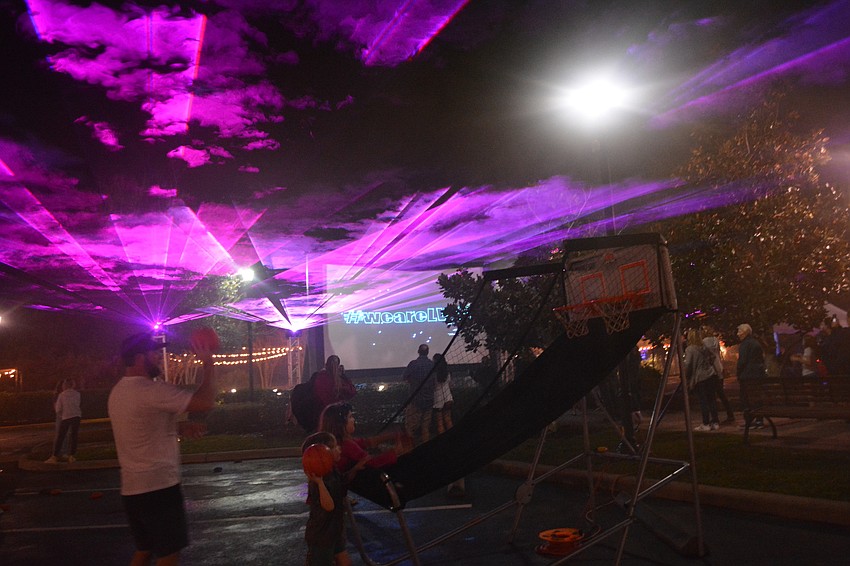 Guests enjoyed a laser light show halfway through the event.