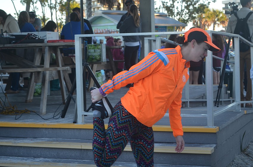 Hannah Lemke stretches before the race.