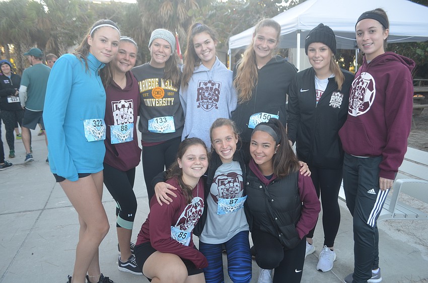The girls Riverview High School came out to show support for Andrew Monroe, who played soccer when he attended Riverview.