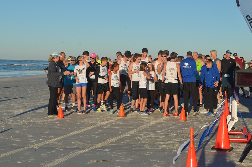 The runner line up to start the race.
