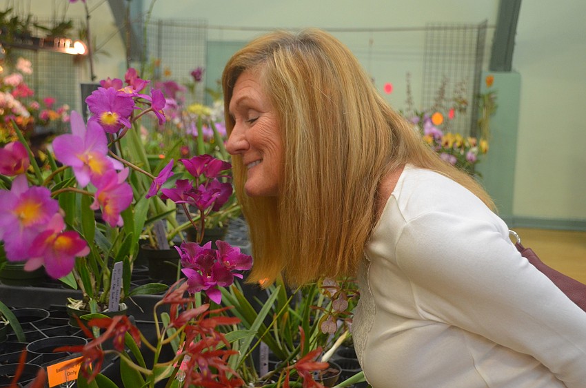 Don't be afraid to stop and smell the flowers, like Susan Swanson.