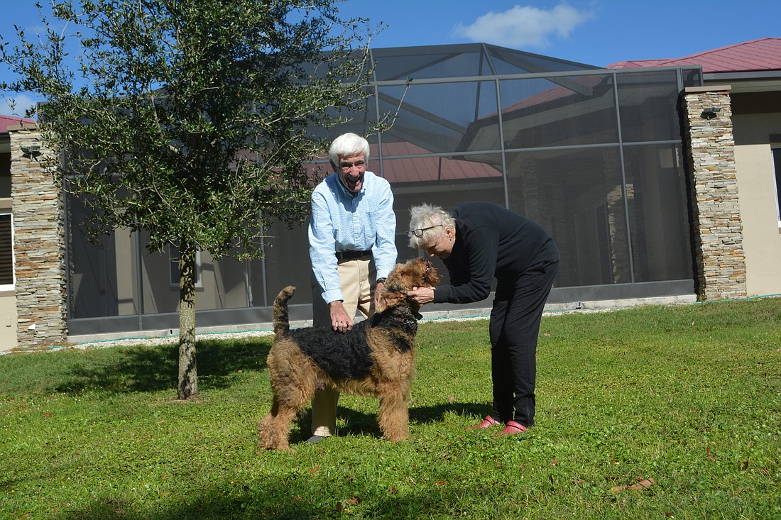 Jeremy and Myrna Whatmough, of the Sarasota Polo Club, were convinced their dog, Reagan, would be hit by a car after he escaped, but were relieved he safety returned home.