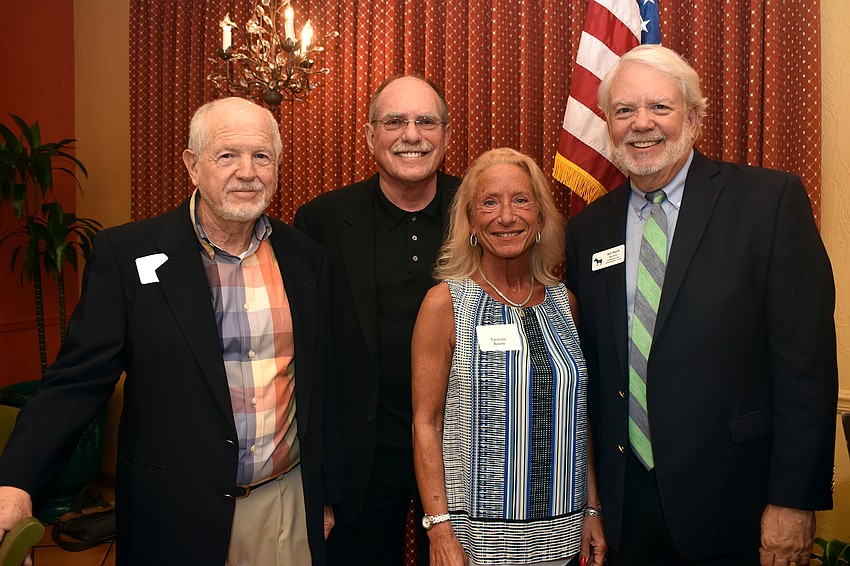 Bob Gary, guest speaker David Houle, Victoria Baum and Longboat Key Democratic Club President Ken Marsh
