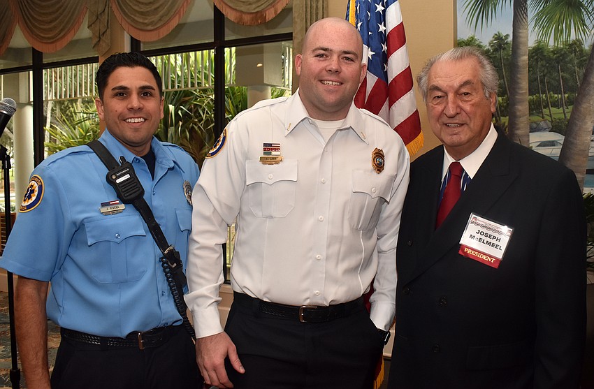 Jose Rivera and Bryan Carr of the Longboat Key Fire Rescue and Republican Club of Longboat Key President Joe McElmeel