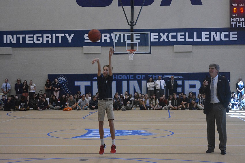 Zach Fox makes the first shot at ODA's Fox Field House.