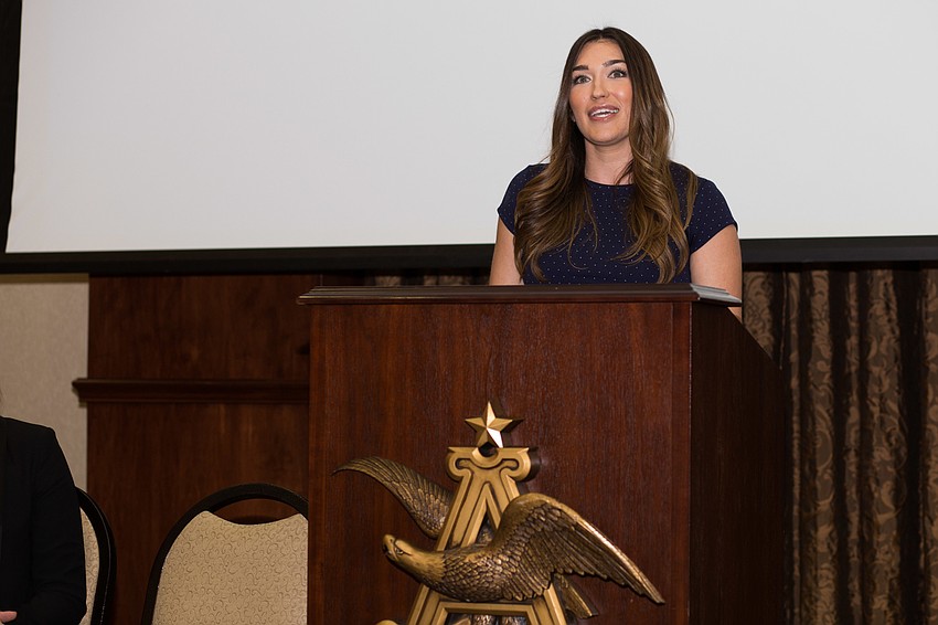 President Ashley Guttridge welcomes everyone to the Grant Ceremony.