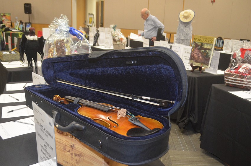 The violin kit, which is $1,200 is the most expensive item auctioned off at the Crystal Ball.