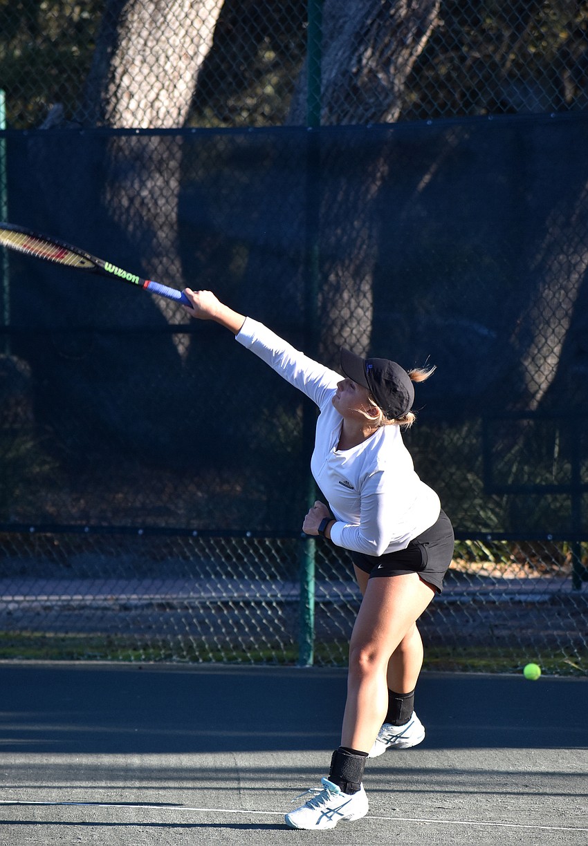 Sandra Weiss serves the ball during the exhibition game.