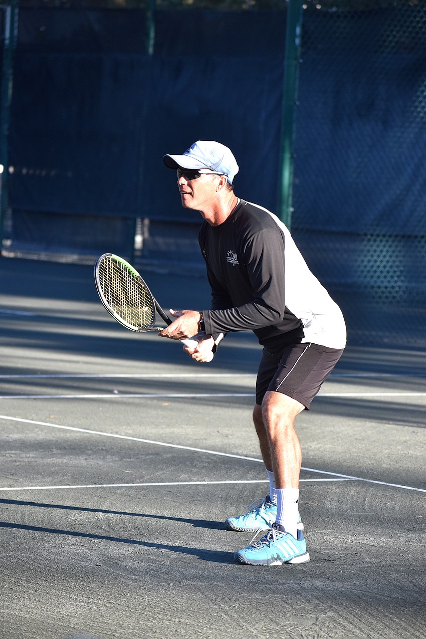 Claudiu Retean competes during a mixed doubles exhibition match.