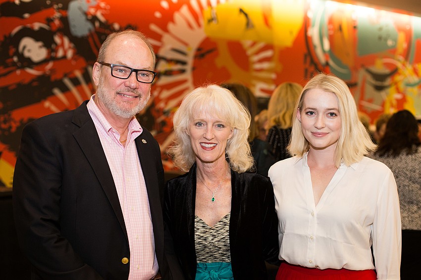 Tom Koski, Chairwoman Mitzie Henson and Emma Henson