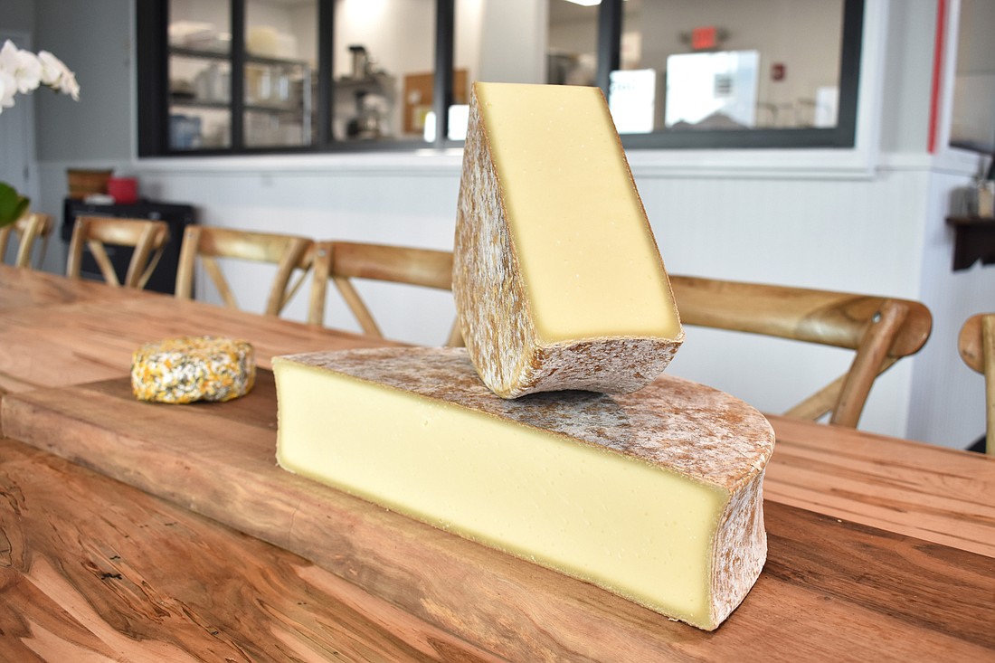 Artisan Cheese Co. features a wide array of cheese, including the above Alpha Tolman from Vermont. Photo by Niki Kottmann