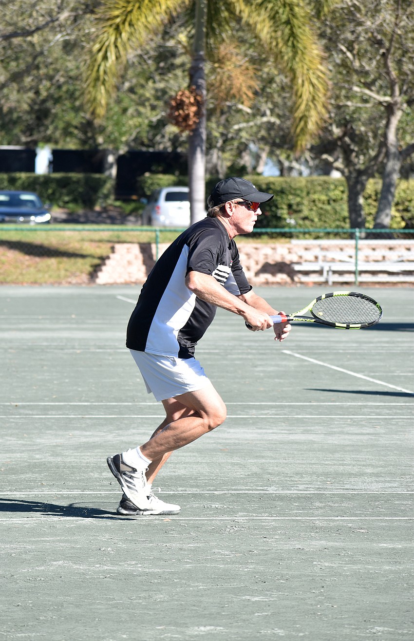 David Glorius competes in a preliminary round doubles match.