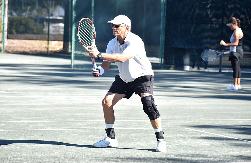 David Schwartz competes in a doubles match.