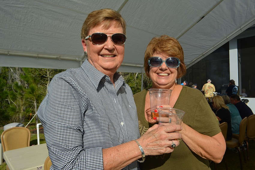 Eagle Trace's Sharon Lahl joined the Elks during the open house while neighbor Diane O'Conner already is a member.