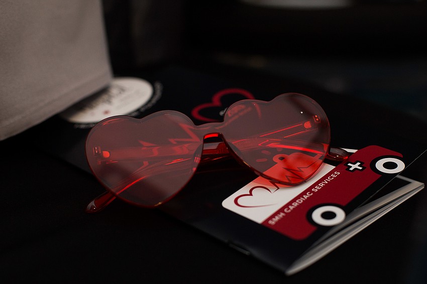 Heart shaped glasses were placed in the center of the tables.