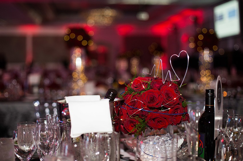 The centerpieces were red roses and beating hearts.