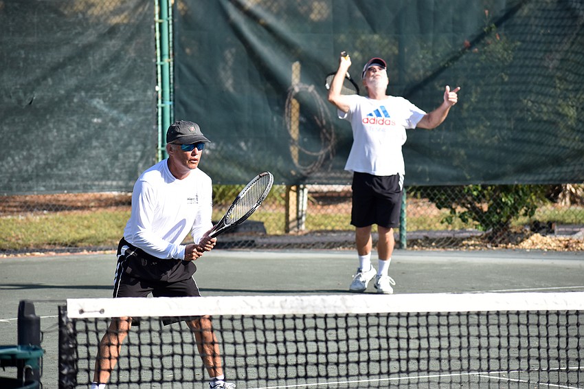 Bill Hocker and Bob Fletcher compete in a final doubles match on Sunday, Jan. 13.