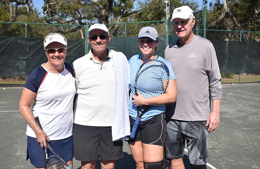 Division 2 runners-up Cathy Powell, Dave Schwartz, Lindsey Shebuski and Charlie Muntan