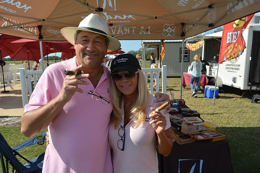 Paul and Dee Dee Gray, owners of Maduro Cigar & Bar, set up a booth along the sideline. Their event, The Maduro & Diamond Vault Cup, will be Jan. 27.