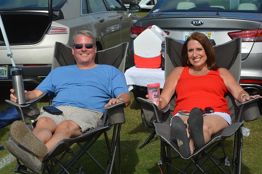 Lakewood Ranch's Steve Nelson and Safety Harbor's Linda Peterson kick back while doing a little tailgating at the polo match.