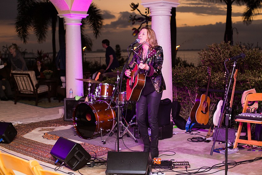 Michelle Malone takes the stage for the concert.