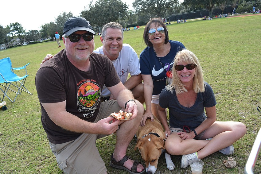 Summerfield residens John Cranos, John Hennesey, Robin McCormick and Ellen Cranos (with dog, Parker), enjoyed spending time together and listening to music.