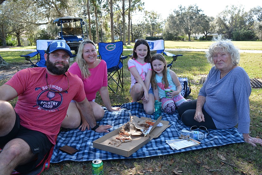 The Brunner family — Darren, Traecy, Ryelynn and Marla — came on a golf cart from River Club. They enjoyed the concert with their Aunt Better Green.