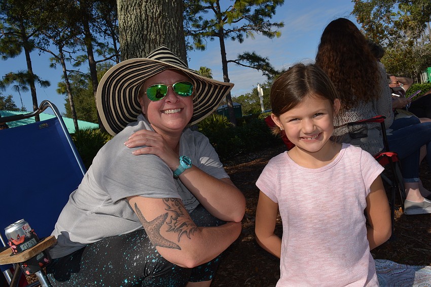 Sarasota's Emily Williams and her niece Piper Payne, of Anna Maria Island, came to hear a family friend play in the band.