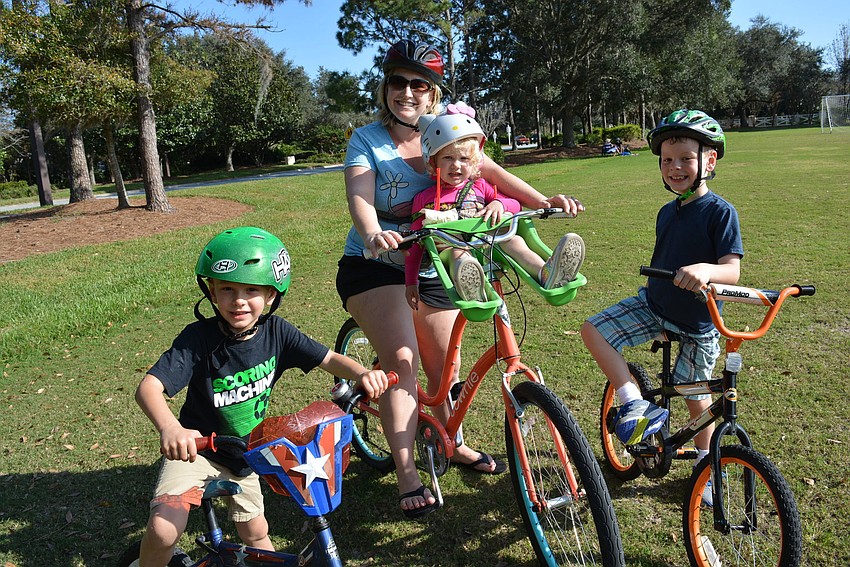 The White family — Oliver, Liz, Caroline, Charlie and Tim (not pictured) — rode their bikes from their home in Summerfield.