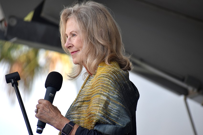 Arlene Morris shares memories of her late husband, Ron Morris, a 2019 inductee, with the crowd.