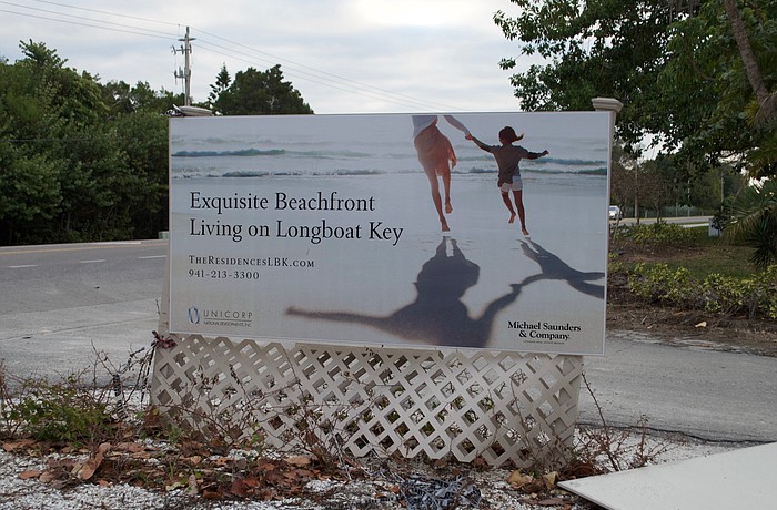 Sign on Gulf of Mexico Drive advertising the St. Regis.