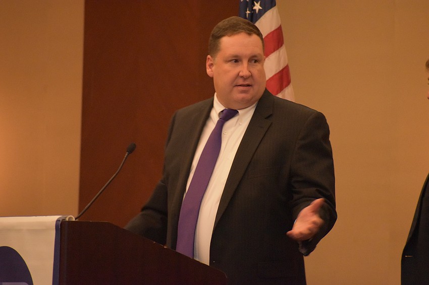 President of the Argus Foundation, Keith Mercier thanks Jack Cox, a past Argus Foundation president, for his service.