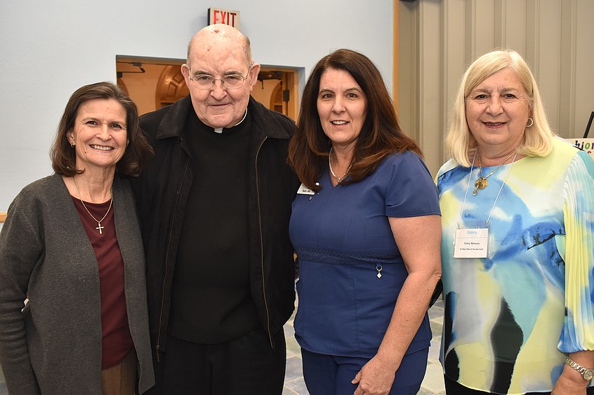 Karen Liebert,  Monsignor Gerry Finnegan, Patty Madsen and Ginny Akhoury