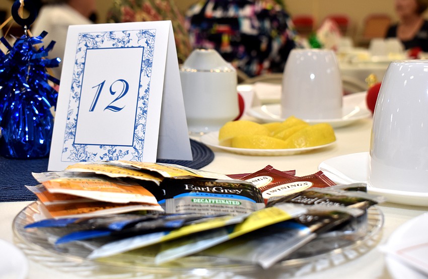 The attendees enjoyed a variety of teas, sandwiches and scones.