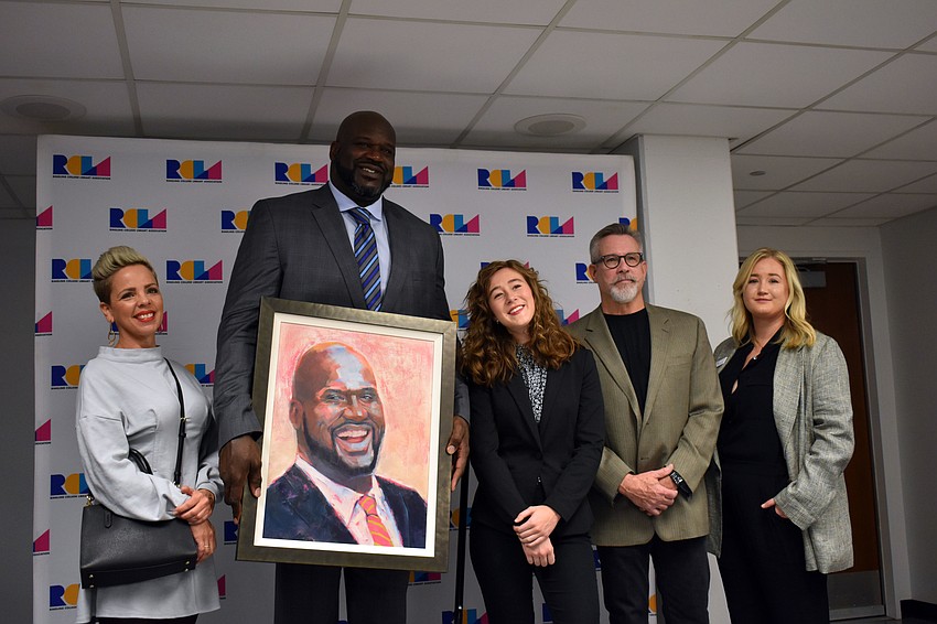 Valerie Strenk, Shaquille O'Neal, Jamie Green, Scott Gordley and Ashley Hawkins pose for a photo Jan. 16.