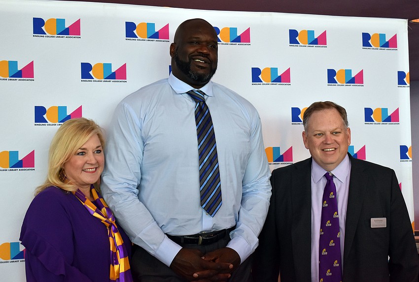 David Verinder, CEO of Sarasota Memorial Health Care System, and his wife Monica posed for a photo with Shaquille O'Neal.