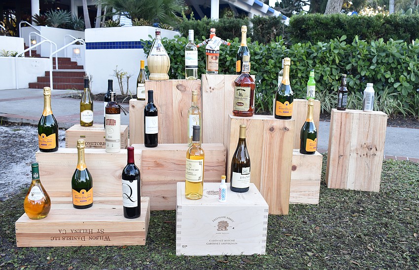 Golfers participated in a ring toss where they tossed a ring and if it went around a bottle of alcohol, they won the bottle.