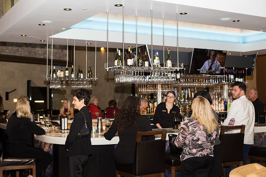 During cocktail hour, guests hung out at the CineBistro bar.