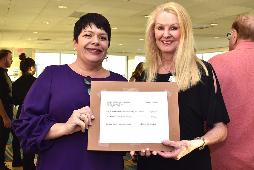 Holiday Inn General Manager Kym Mackenzie and Garden Club President Susan Phillips