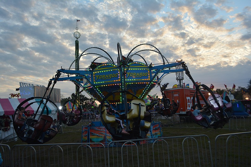 Besides all the exhibits, the fair features plenty of rides and games.