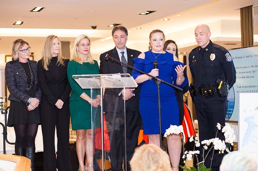 Kelly, a sex trafficking survivor, tells her story on stage with local professionals who helped to convict her trafficker.