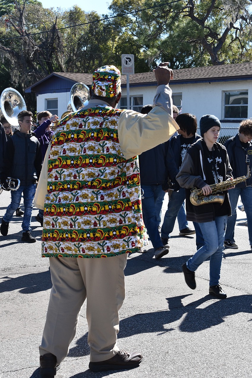 Freddie Atkins directs the marchers.