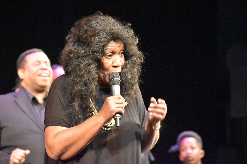 Elaine Mayo performs as one of the featured soloists.