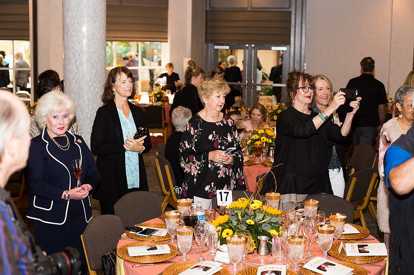 Guests hovered around MacGraw to take a photo of her.