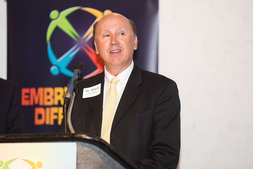 Mark Pritchett spoke about the outdoor exhibit on the bayfront.