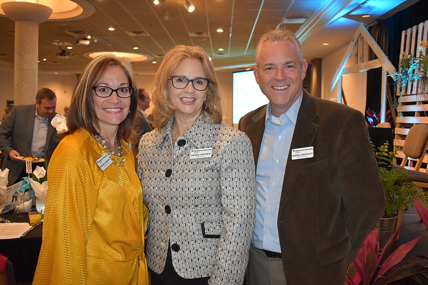 Habitat for Humanity Sarasota Program Director Rhonda Leiberick, Habitat for Humanity Sarasota CEO Renee Snyder and Habitat for Humanity Sarasota Board Member David Langhout